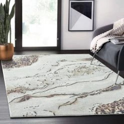 Venus Beige 6 ft. x 9 ft. Abstract Polypropylene Area Rug by Abani -Abani Sales beige abani area rugs vns130a 6 31 1000