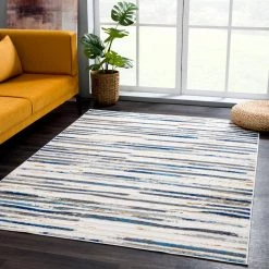 Dune Grey 5.3 ft. x 7.6 ft. Striped Polypropylene Area Rug by Abani 17 Dune Grey 5.3 ft. x 7.6 ft. Striped Polypropylene Area Rug by Abani -Abani Sales grey abani area rugs dun170a 5 31 1000