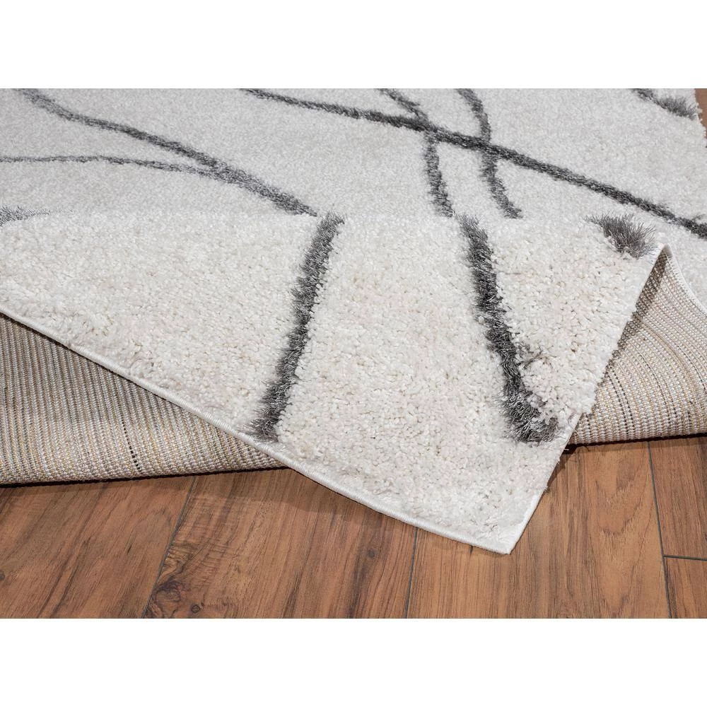 Abani Boston Ivory 6 ft. x 9 ft. Shag Polyester Area Rug 5 Abani Boston Ivory 6 ft. x 9 ft. Shag Polyester Area Rug - Image 3